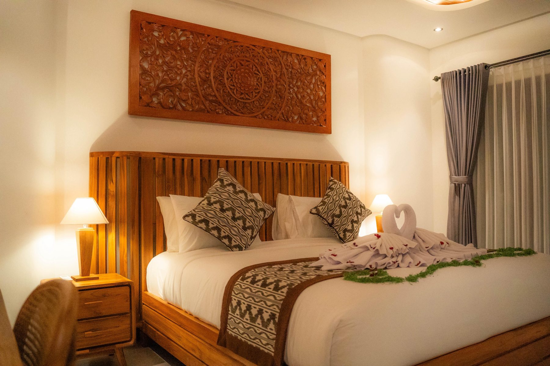 Bedroom detail with folded towels